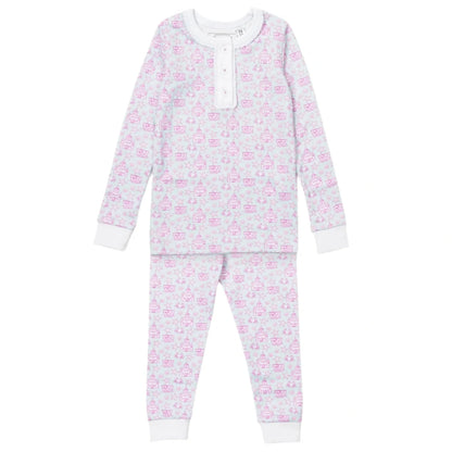 The Lila & Hayes Girls' Alden Pajama Set features a long-sleeve top and pants in ultra-soft Pima cotton, adorned with a light pink and purple cat print on white.