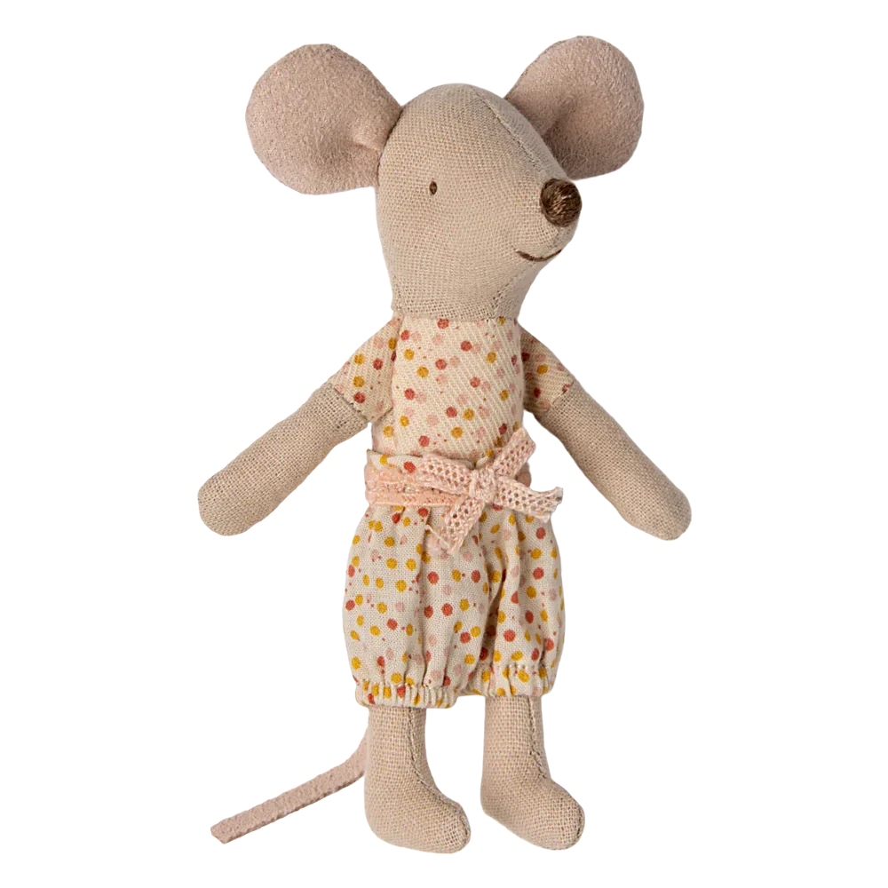 The Maileg Little Sister, Mouse in Matchbox by Maileg is crafted from soft fabrics and wears a charming patterned dress with a pink bow. Featuring large round ears and a long thin tail, this adorable mouse doll is perfect for imaginative play. Complete the set with her cozy matchbox bed for added fun.