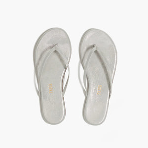 Tkees Lily Glitters Sandals feature thin straps and a cushioned insole, displayed from above on a white background.