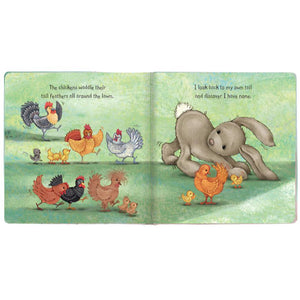 Featuring charming illustrations from the "Jellycat Little Me Book" by Jellycat, this delightful children's board book showcases chickens and their chicks on the left side, while a bunny peeks over its shoulder on the right. The text reads: "The chickens waddle their tail feathers all around the lawn." "I look back to my own tail and discover I have none.