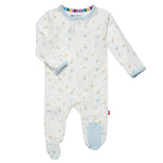 Introducing the delightful Magnetic Me Blue Little Bitty Pretty One Footie. This charming white infant onesie showcases a pastel animal print, footed bottoms, blue trim, and an eye-catching rainbow collar detail. Enhanced with SewSafe™ magnetic closures for easy dressing, it ensures your little one stays comfortable and stylish.