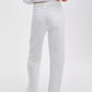 A person is seen from the back in Rag & Bone Featherweight Logan Wide mid-rise jeans and a white long-sleeve top, set against a plain white background.