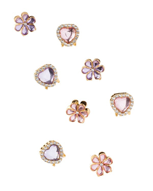 Nine gold earrings with flower and heart designs, accented by pink, purple gemstones and clear rhinestones, sit on a white background—perfect to pair with your favorite Super Smalls Love in Bloom Hair Clips.