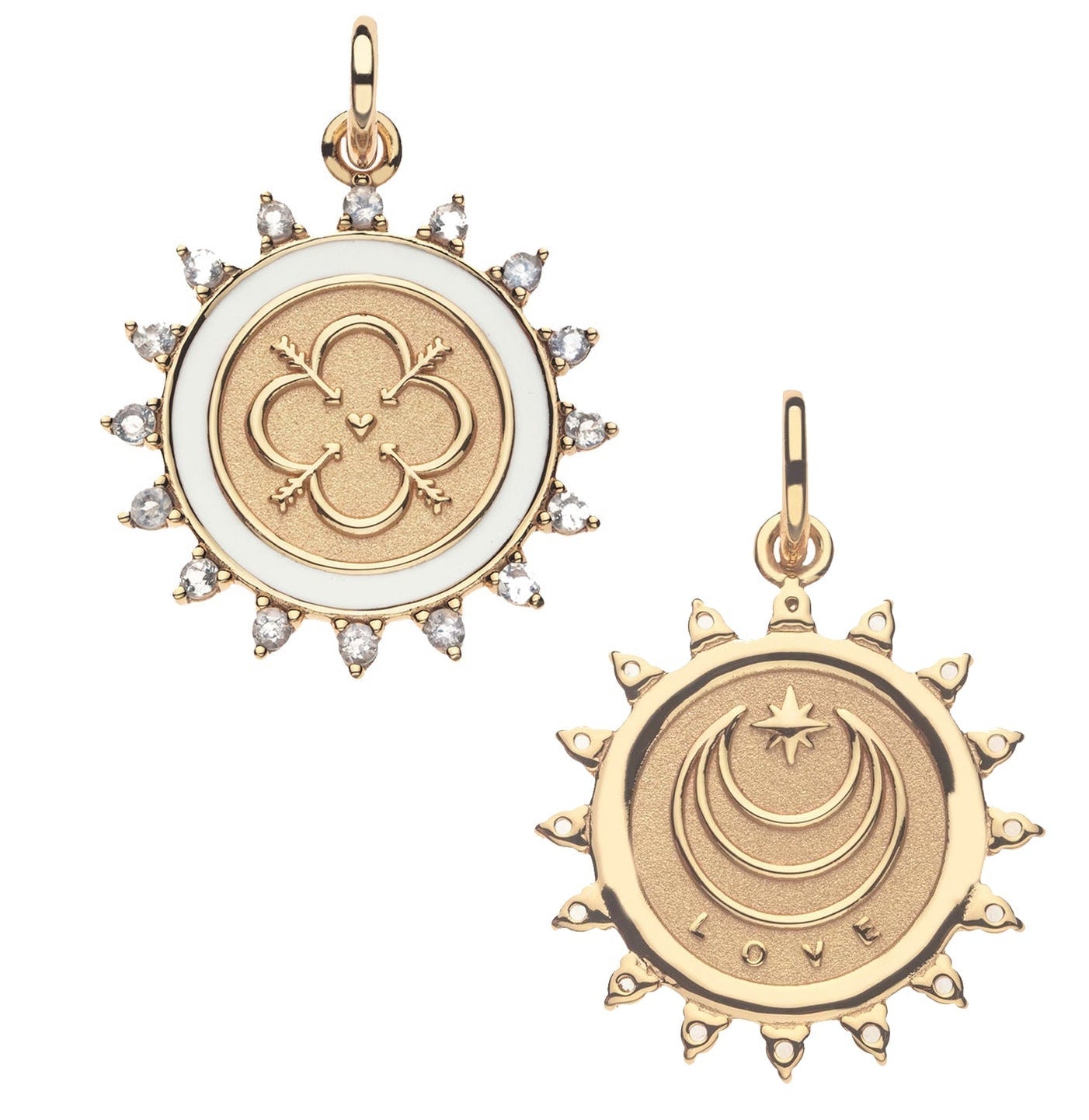 The Jane Win Pendant Necklace Collection features two gold sun-shaped milestone necklaces with gemstone accents: one with clover and heart motifs, the other with crescent moons, a star, and "LOVE"—a meaningful jewelry duo.