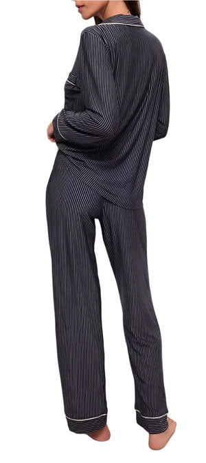 A person wearing the Eberjey Tencel Modal Long PJ Set, made from luxurious knit fabric with white vertical stripes, viewed from behind.