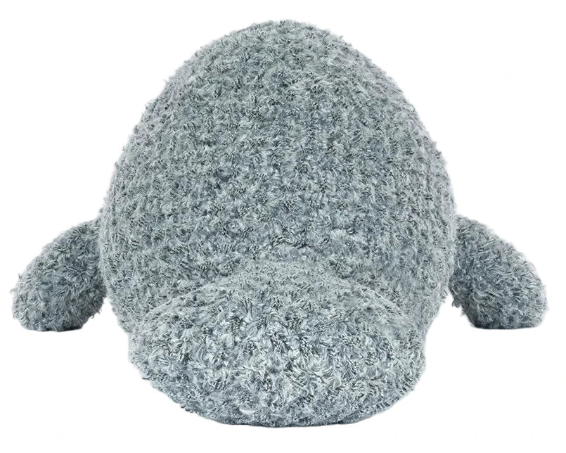The Jellycat Maffles Manatee is a grey, plush stuffed animal shaped like a manatee, shown facing forward against a white background—ideal for those who dream of underwater adventures and cozy plush companions.