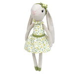 The Daisy Bunny by Mon Ami is a charming plush toy featuring a floral dress and matching headband with a bow, perfect for an Easter basket.