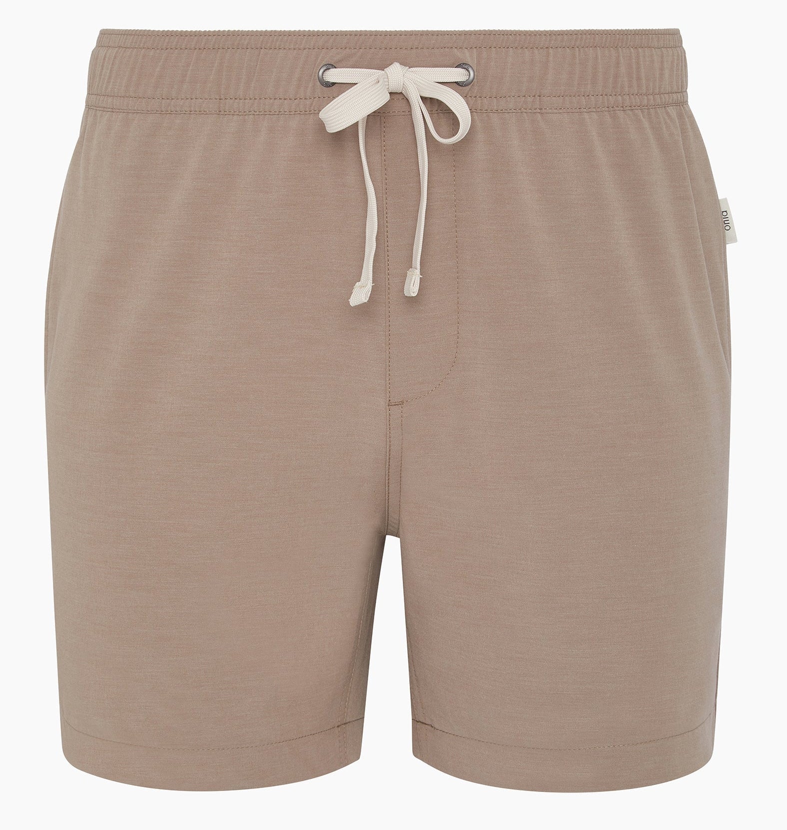 The Onia Land to Water Short 6" in taupe features an elastic waistband, white drawstring, four-way stretch fabric, and a small side tag, displayed against a white background.