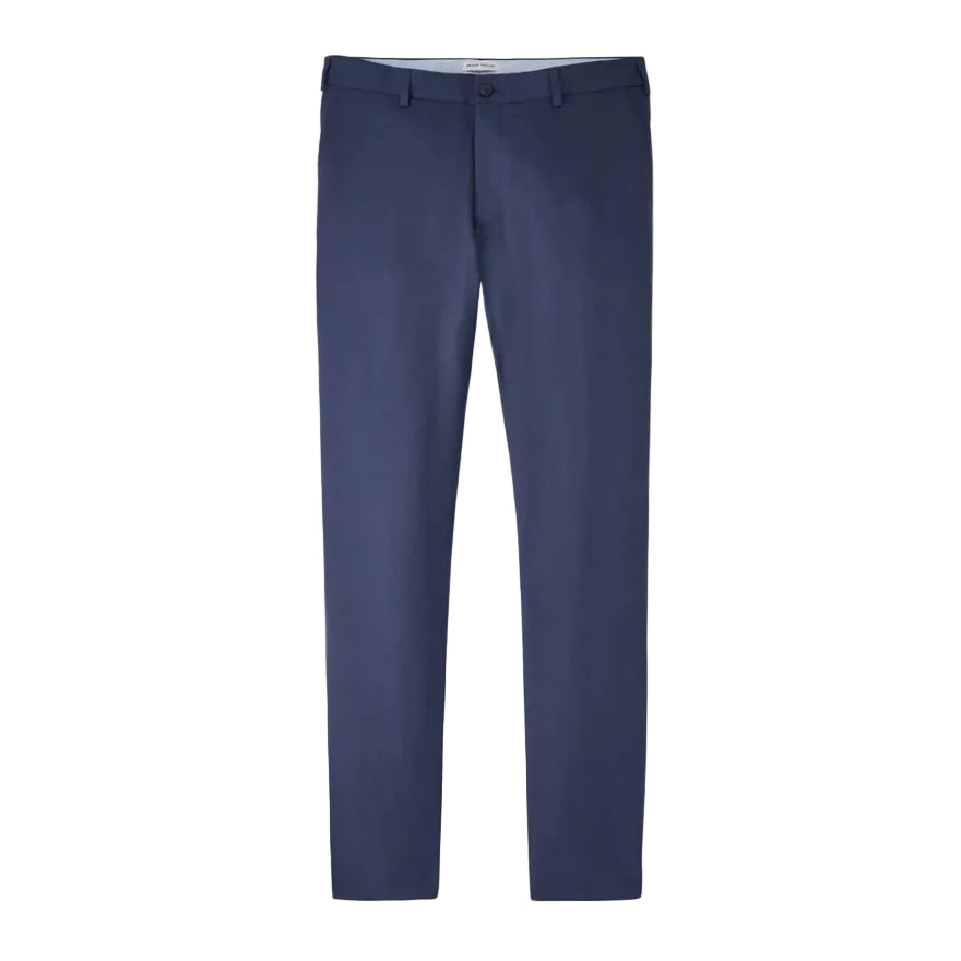 The Peter Millar Charlotte Performance Trouser is a straight-leg navy dress pant in stretch mélange fabric with belt loops, button closure, and side pockets, displayed against a white background.
