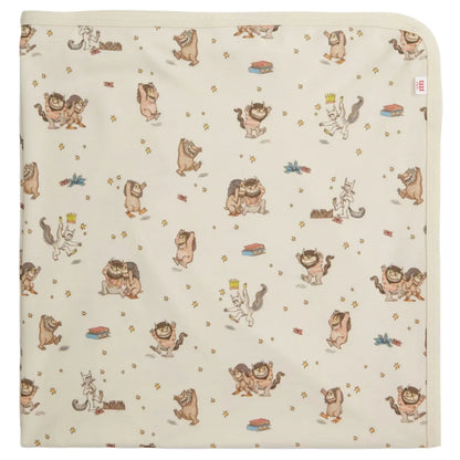 The Magnetic Me Where the Wild Things Are Blanket is a cream-colored modal baby blanket with playful wild creature and crowned boy illustrations, offering softness and temperature regulation—ideal as a stroller blanket.