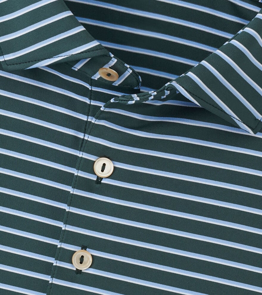 Close-up of a green Peter Millar Dunnes Performance Jersey Polo with white stripes and three beige buttons, featuring four-way stretch for comfort and UPF 50+ sun protection.