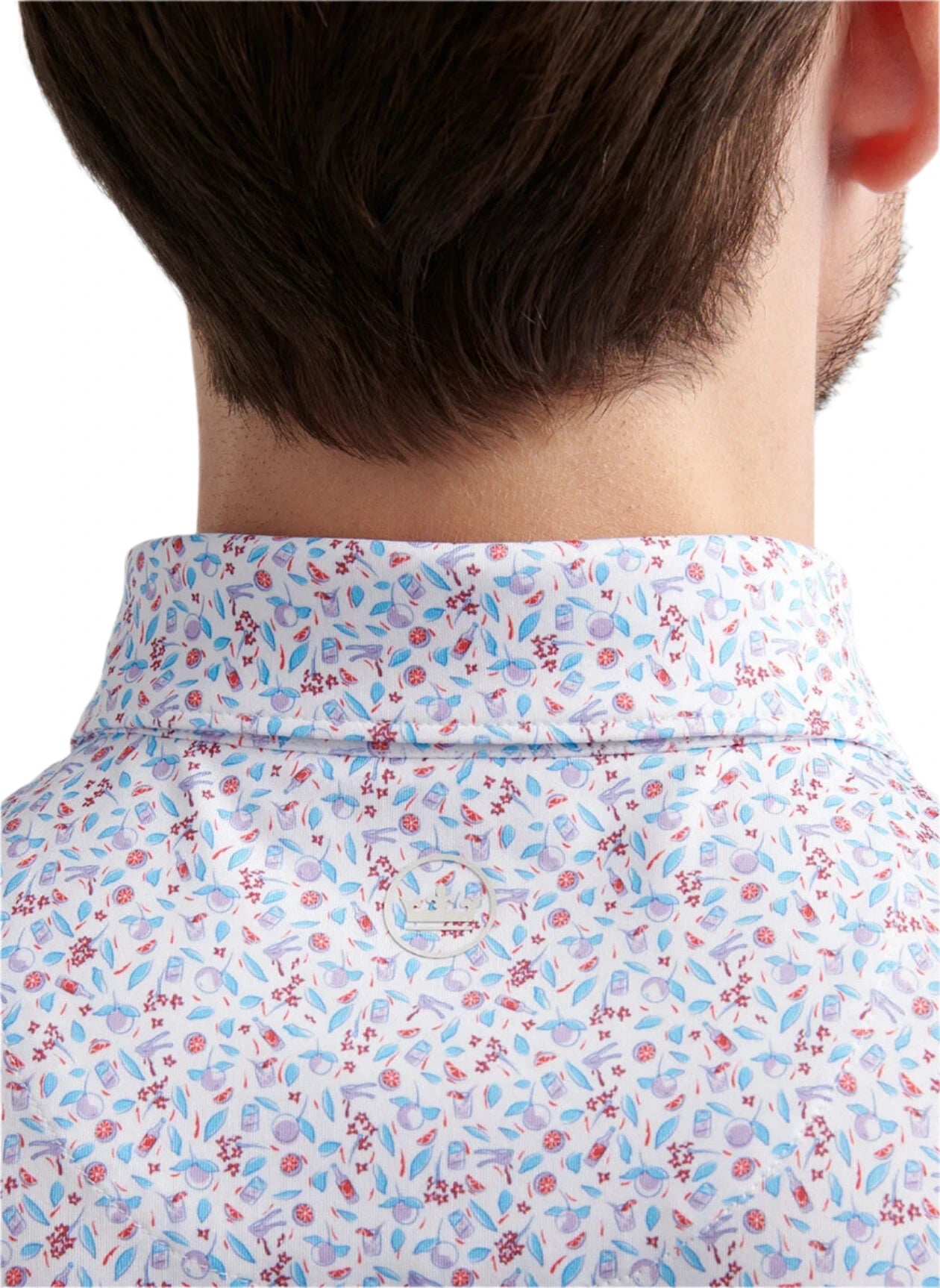 Close-up of the back of a person's neck and shoulders, wearing a Peter Millar Orange Crush Performance Jersey Polo with UPF 50+ protection.