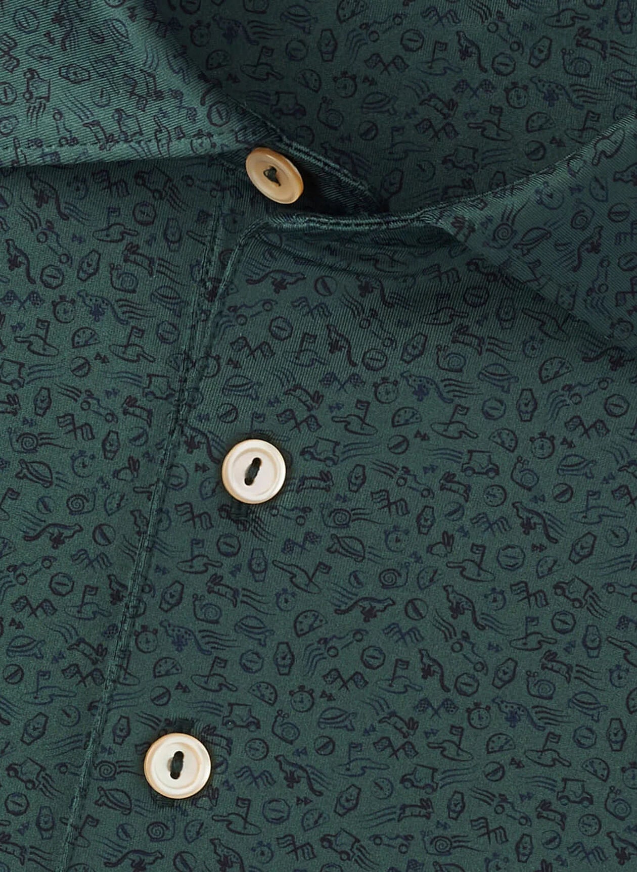 Close-up of a green Peter Millar No Slow Play Performance Jersey Polo featuring a subtle dark abstract pattern, four beige buttons on the placket, and four-way stretch for enhanced comfort.