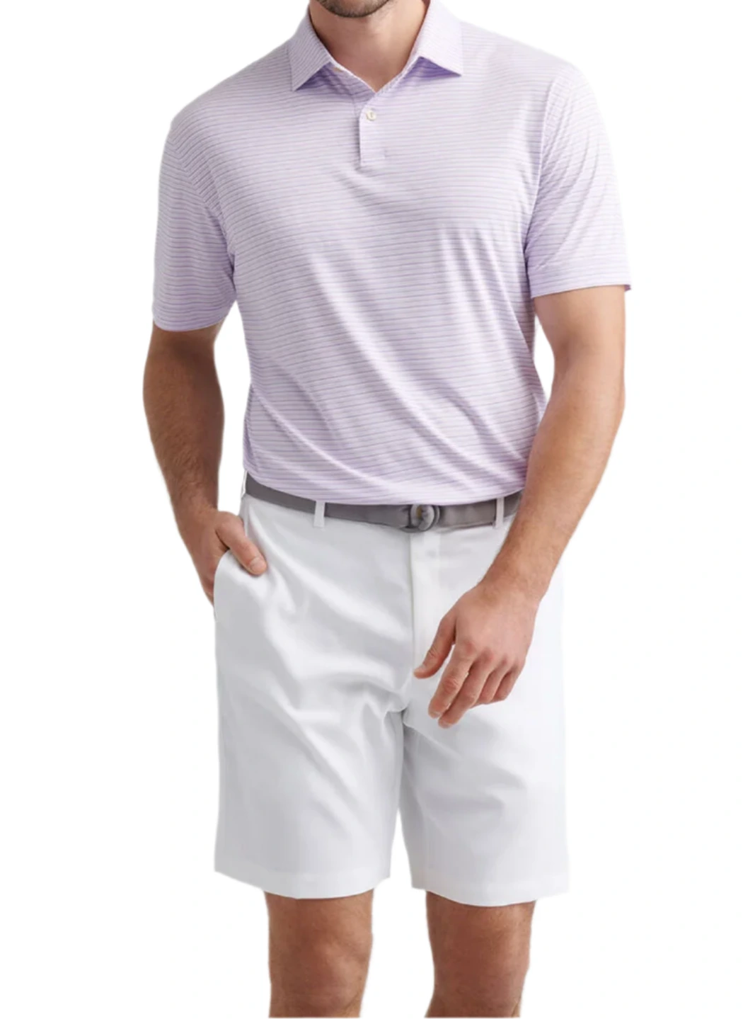 A man wearing the Peter Millar Featherweight Payne Stripe Performance Polo, a gray belt, and white shorts stands with one hand in his pocket against a plain background.