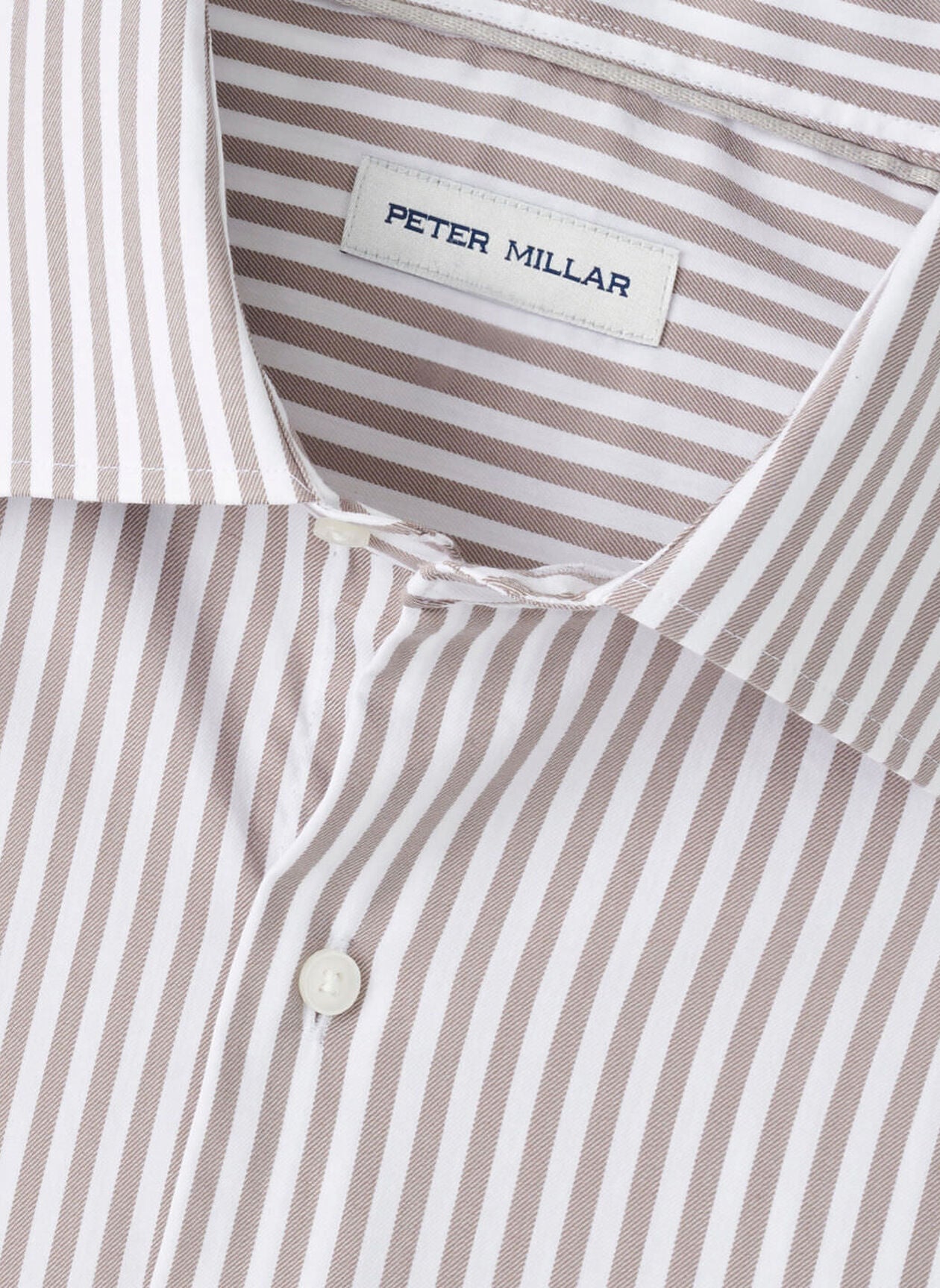 Close-up of the Peter Millar Cannon Crown Lite Cotton-Stretch Sport Shirt in brown and white vertical stripes, featuring an easy-care fabric and visible brand label inside the collar.