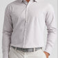 A man wearing the Peter Millar Cannon Crown Lite Cotton-Stretch Sport Shirt—this long-sleeve, button-up features vertical beige and white stripes and easy-care fabric, paired with light pants and a patterned belt for effortless style.