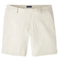 The Bingham Performance Short by Peter Millar is a beige, lightweight casual short with belt loops, side pockets, and a button closure, shown against a white background.