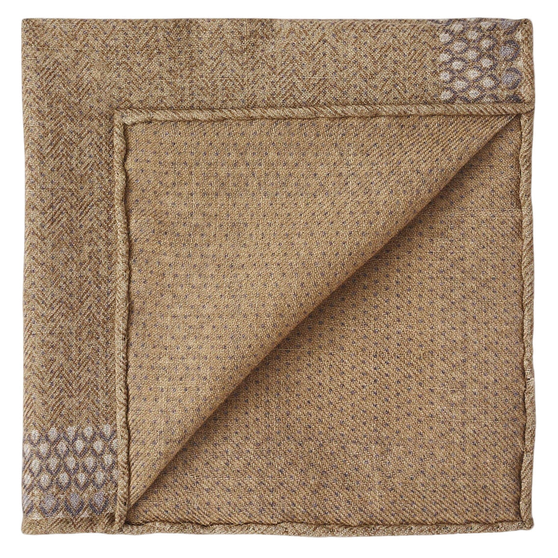 The Wells Pocket Square by Peter Millar features elegant brown Italian wool, folded to highlight its subtle herringbone pattern and small geometric corner designs.