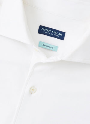 Close-up of the Peter Millar Excursionist Flex Solid Sport Shirt, showing labels inside the collar and crafted from wrinkle-resistant cotton-stretch fabric.
