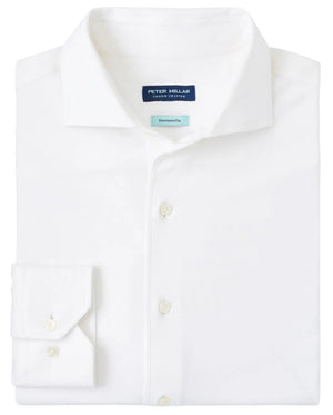 The Excursionist Flex Solid Sport Shirt by Peter Millar is a white, wrinkle-resistant cotton-stretch sport shirt with a pointed collar and buttoned cuffs.