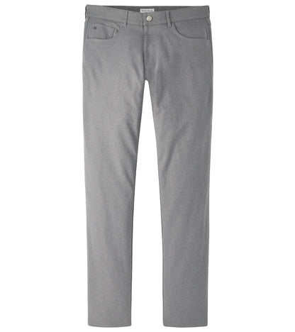 The Peter Millar eb66 Melange Performance Five-Pocket Pant 30″ is a pair of light gray straight-leg pants made from stretch twill fabric, designed with front and back pockets, belt loops, a button closure, and a comfort waistband, shown against a white background.