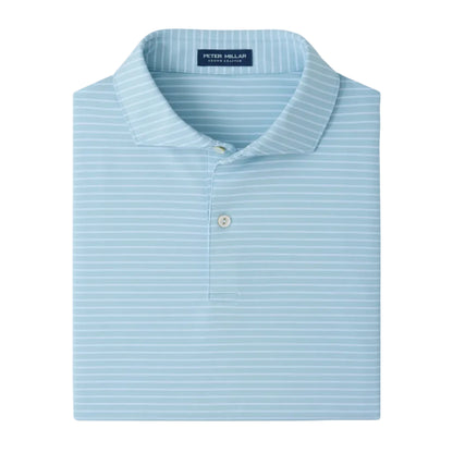A neatly folded light blue Peter Millar Keynote Performance Jersey Polo, featuring UPF 50+ sun protection, thin white horizontal stripes, and a two-button placket, displayed against a white background.