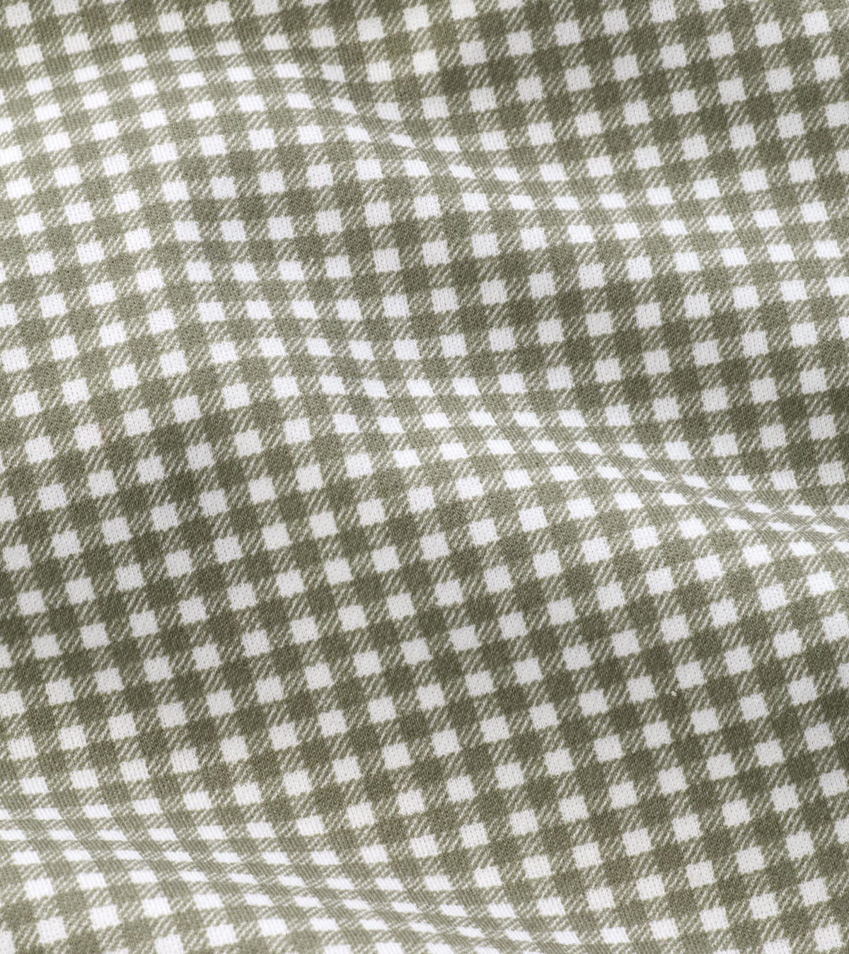 Close-up of a sage green and white gingham Peter Millar Excursionist Flex Gingham Sport Shirt.