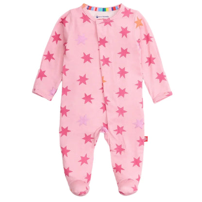 The Magnetic Me Baby Girls' Cosmic Confetti with Foil Modal Footie is a pink long-sleeve onesie with covered feet, red and purple star pattern, and magnetic closures for quick changes.