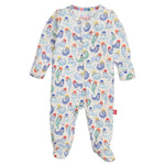 The Magnetic Me Captain Wally Modal Footie features a fun sloth print on white, long sleeves, and easy magnetic closures down the front for fast changes.