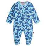 The Magnetic Me Baby Boys' Necks Generation Modal Footie is a light blue onesie with long sleeves, feet, a blue dinosaur print, rainbow-striped neckline, and magnetic closures for easy changing.