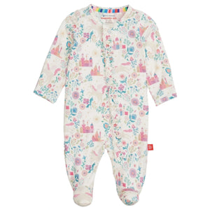 The Magnetic Me Baby Girls' Tail of Magic with Ruffle Modal Magnetic Footie features long sleeves, covered feet, colorful castles, unicorns, flowers, and easy magnetic closures for quick changes.