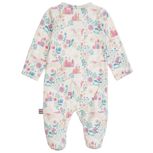 The Magnetic Me Baby Girls' Tail of Magic with Ruffle Modal Magnetic Footie features a fairy tale castle and floral print on white, long sleeves, and easy magnetic closures for quick diaper changes.