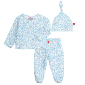 The Magnetic Me Baby Modal Kimono Take Me Home Set features a blue and white animal print kimono wrap top, pants, and a knotted hat, all crafted from soft, sustainable modal for cozy comfort. Displayed on a white background.