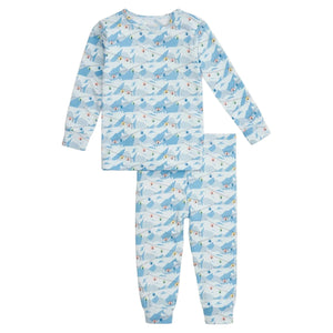 The Magnetic Me Baby and Kids' Apres Chic Modal PJ Set features a blue mountain and skier print on a matching long-sleeve top and pants, crafted from ultra-soft modal fabric.