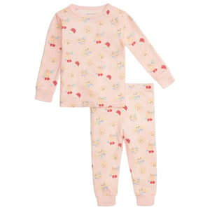 The Magnetic Me Baby Girls' and Girls' Bake My Day Modal PJ Set features pink long sleeves with a fun print of waffles, eggs, butter, and hearts—ideal cozy, sustainable sleepwear for kids.