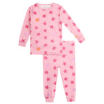 The Magnetic Me Baby Girls' and Girls' Cosmic Confetti Modal PJ Set features soft modal fabric, pink long sleeves, and matching pants with a vibrant red, pink, and orange star print for cozy comfort.