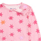 The Magnetic Me Baby Girls' and Girls' Cosmic Confetti Modal PJ Set features a soft pink long-sleeve top with darker pink and orange stars, crafted from modal fabric and designed with a snap button on the shoulder for easy dressing.