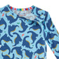 The Magnetic Me Baby Boys' and Boys' Necks Generation Modal PJ Set features a light blue long-sleeve shirt with dark blue dinosaur prints, small colorful shapes, and a rainbow-striped inner collar—perfect for stylish comfort.