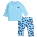The Magnetic Me Baby Boys' Necks Generation Modal Long Sleeve Henley + Pant Set features a light blue top with a small dinosaur graphic and matching pants with an all-over blue dinosaur print—crafted for comfort and easy diaper changes.