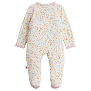 The Magnetic Me Baby Girls' Oinklet Model Footie features long sleeves, enclosed feet, and a pastel floral print with pink trim at the neckline and cuffs. Designed for convenience, it offers easy magnetic closures for quick changes. The footie is displayed on a white background.