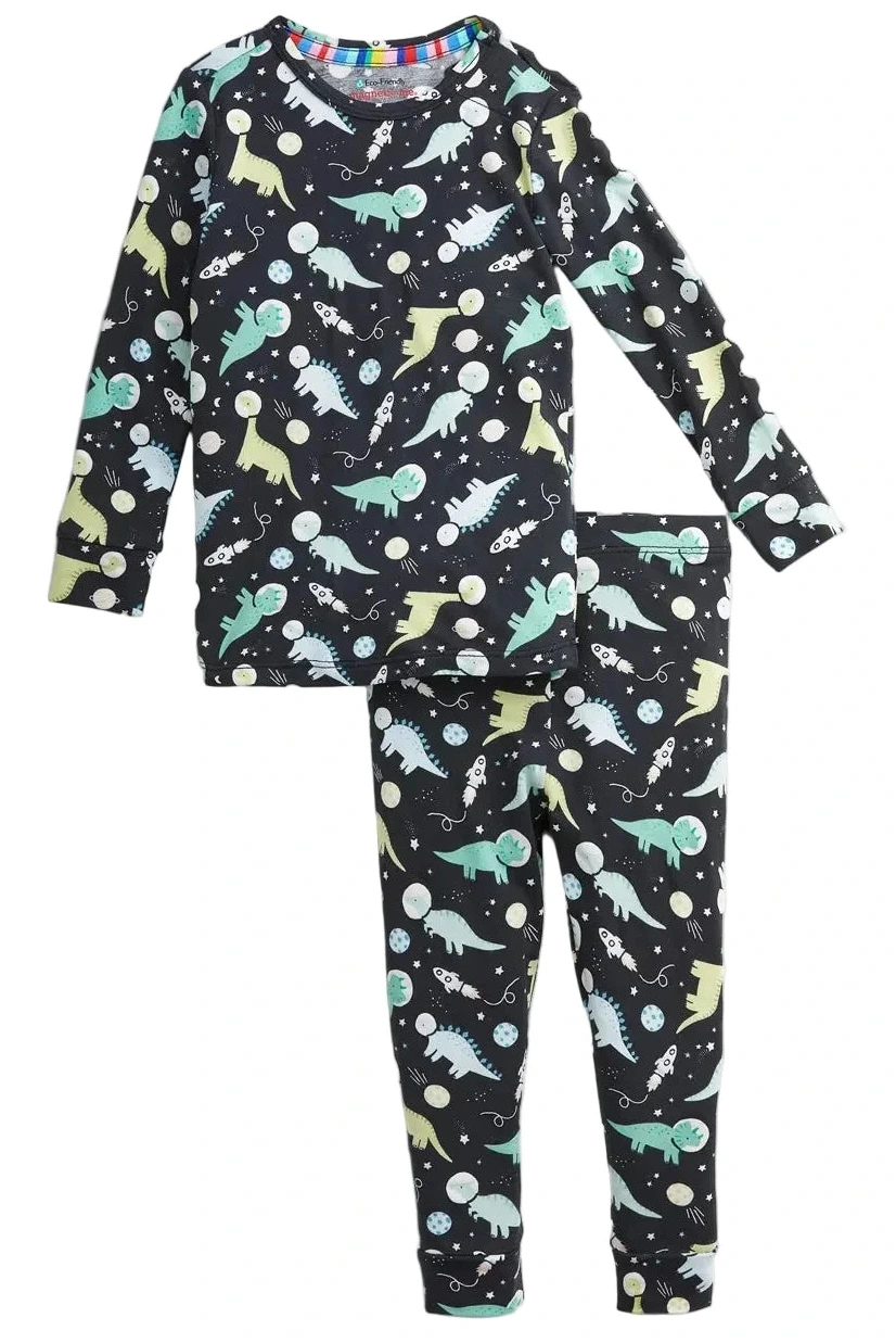 The Baby Boys’ and Boys’ Astroceratops Modal Long Sleeve Pajama Set by Magnetic Me features a black base with vibrant dinosaur and planet prints in green, blue, and yellow.
