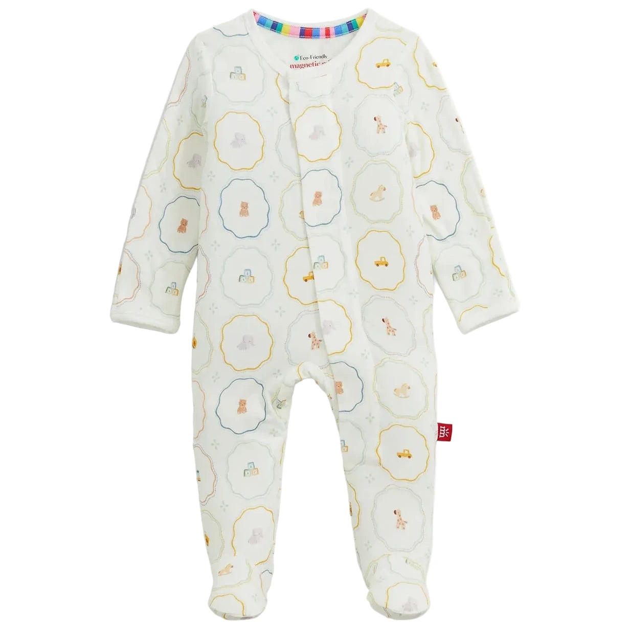 Magnetic Me Baby Nursery Magic Cream Modal Footie features long sleeves, a charming cream design with pastel animal and toy prints, full-length legs, and easy magnetic closures down the front. Made from sustainable modal for exceptional softness and comfort.