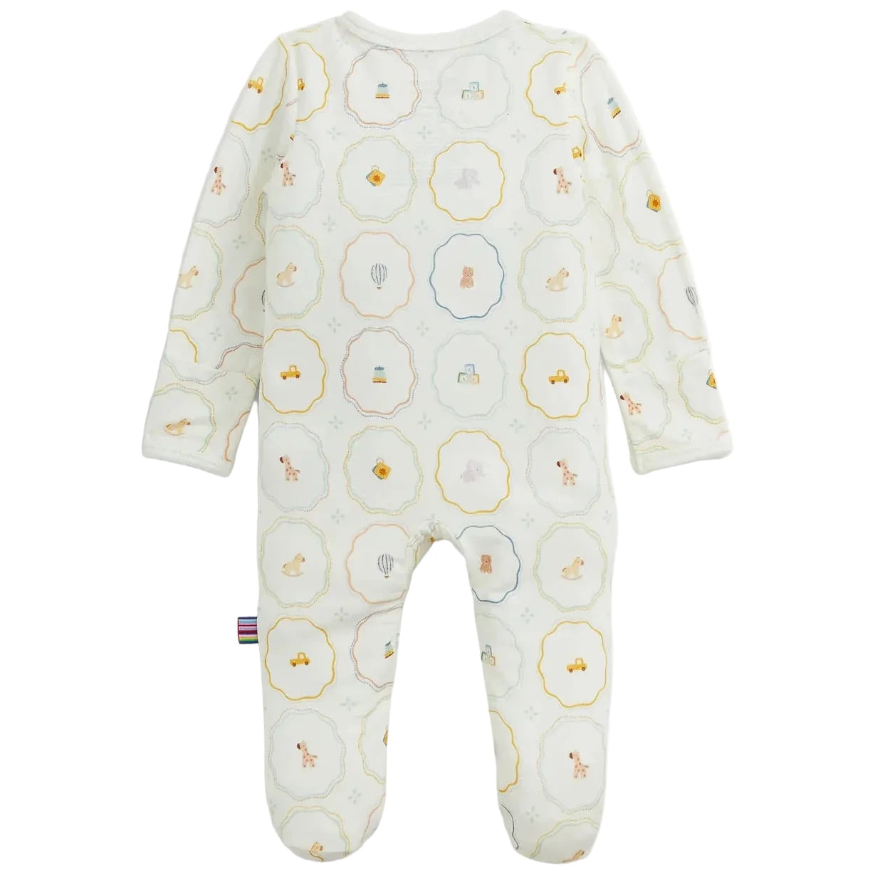 The Baby Nursery Magic Cream Modal Footie by Magnetic Me is a white long-sleeve baby onesie with feet, adorned with pastel animal and toy illustrations inside scalloped circles. Made from sustainable modal for exceptional softness, this footie features easy magnetic closures for quick and hassle-free changes.