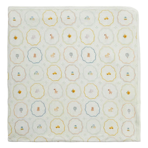 Wrap your little one in the Nursery Magic Modal Baby Blanket from Magnetic Me, featuring a soft white background adorned with a repeating pattern of scalloped circles—each filled with charming illustrations like bears, cars, hot air balloons, and suitcases in soothing pastel hues. Perfect for cuddling at home or as a cozy stroller blanket.