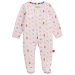 Baby Nursery Nostalgia Modal Footie by Magnetic Me is a pink baby sleeper featuring long sleeves, a footed design, and a playful animal print. Made from soft, sustainable modal fabric, this footie includes convenient magnetic closures for easy dressing. The garment is shown laid flat against a white background.