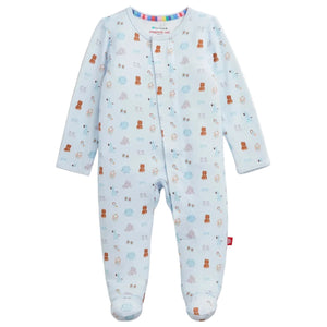 Introducing the Baby Nursery Nostalgia Modal Footie from Magnetic Me — a light blue footed onesie featuring long sleeves, a charming pattern of small animals, and rainbow trim inside the collar. Crafted from ultra-soft, sustainable modal, this adorable footie is designed with magnetic closures for easy and effortless changing.