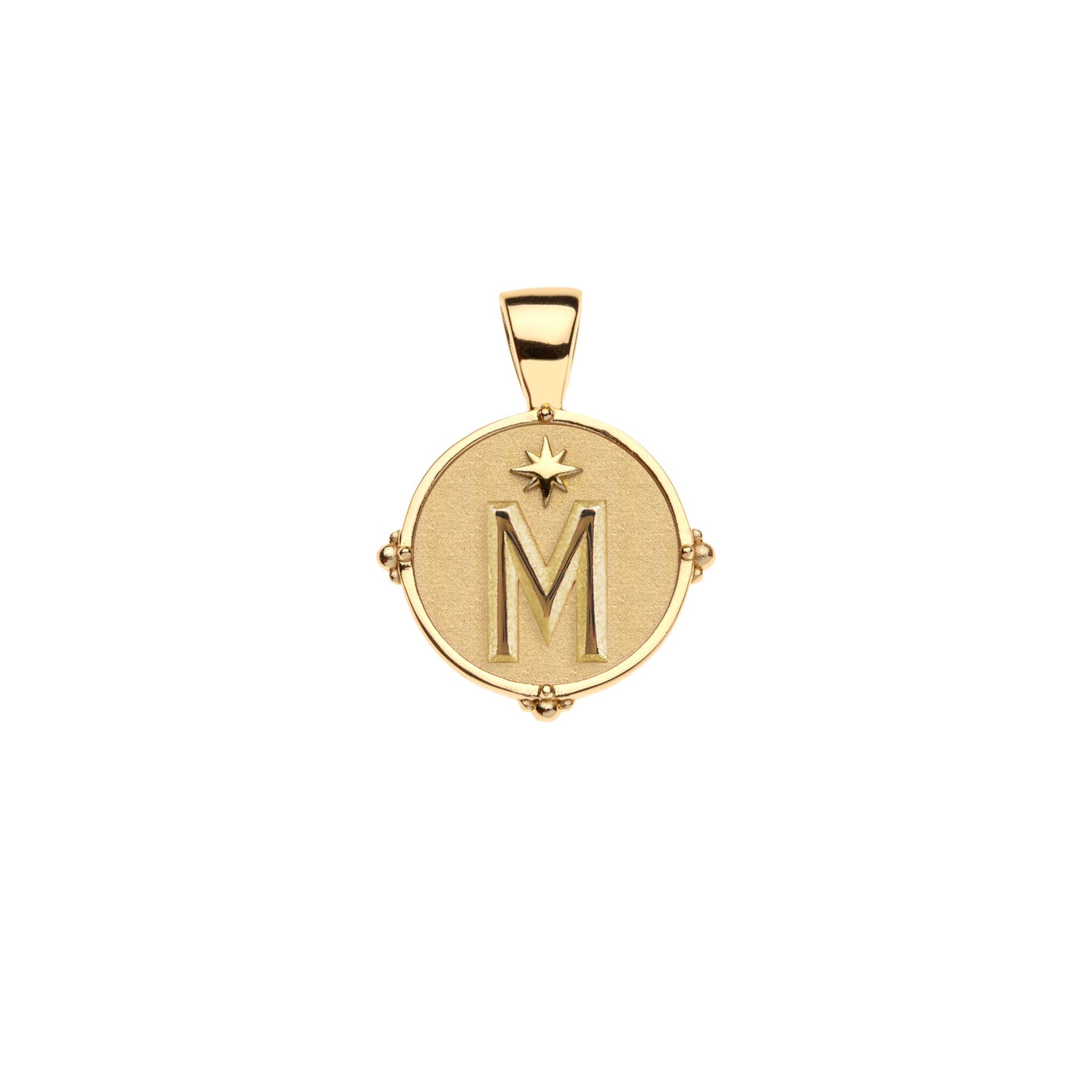 The Letter Pendant Satellite Necklace Collection by Jane Win features a round 14k gold pendant with a raised letter "M" and small star above it, attached to a simple bail for a personalized touch.