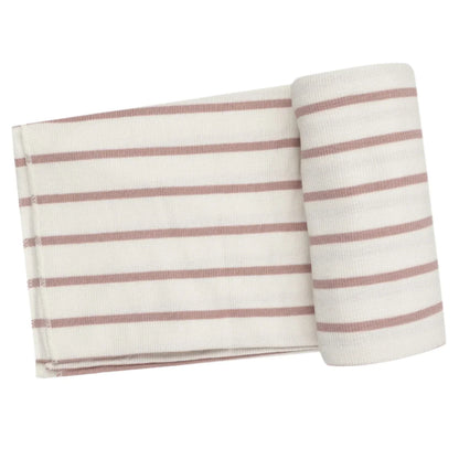 The Angel Dear Modal Rib French Stripe Misty Rose Swaddle Blanket from Angel Dear, featuring an adorable print, is displayed rolled up on a flat surface with its striped white and pinkish-brown fabric visible.