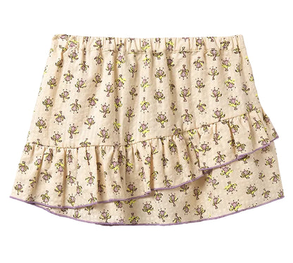 The Cozmo Girls' Molly Flower Print Skirt features a beige floral pattern, ruffle hem, and comfy elastic waistband.