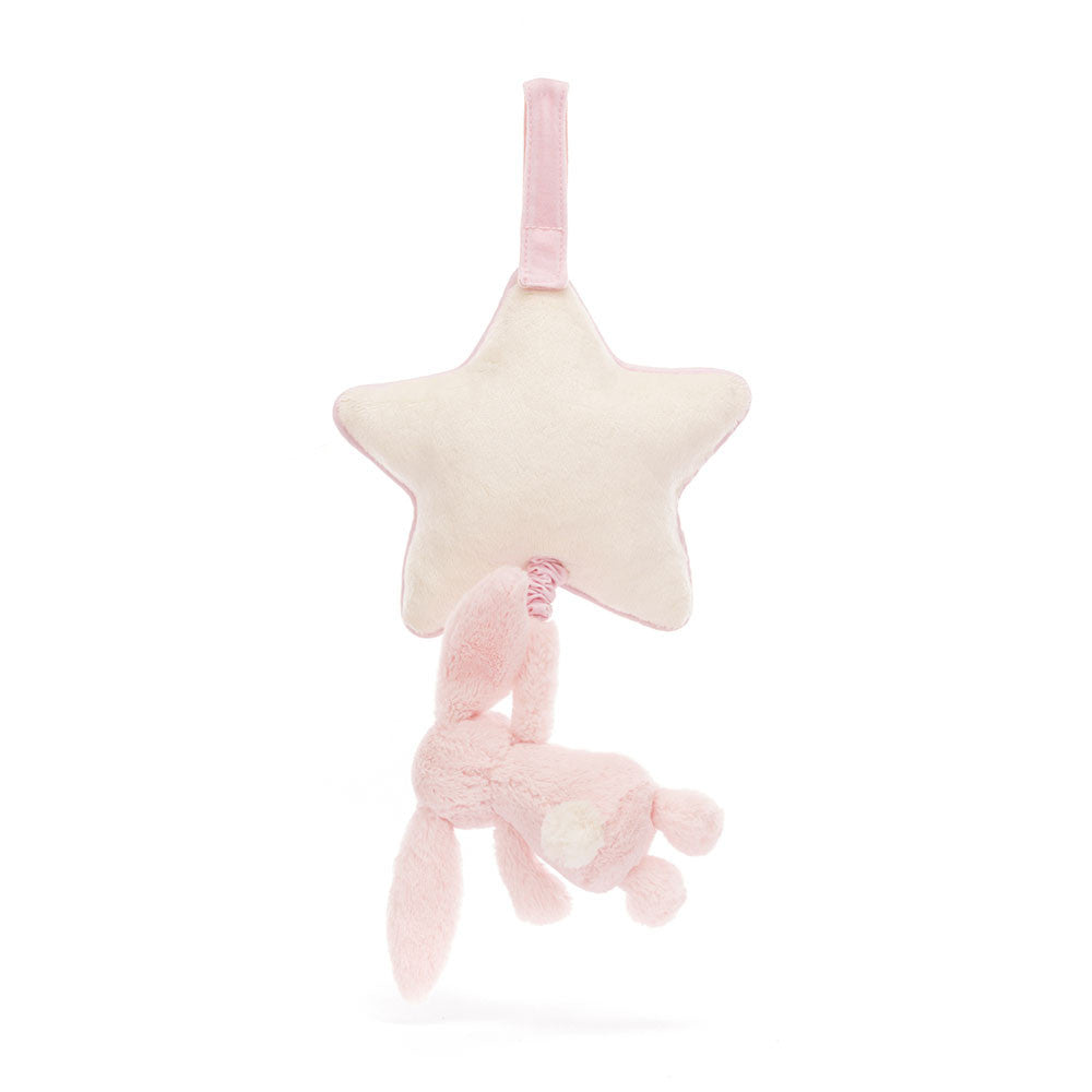 A Jellycat Bashful Blush Bunny Musical Pull with a fabric loop for hanging, featuring a small Bashful Bunny plush dangling from it, making it an ideal newborn gift.